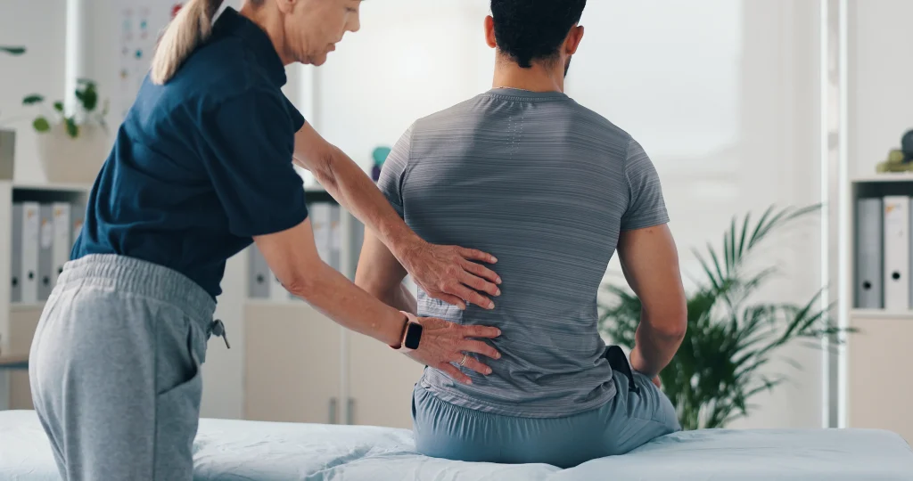 Chiropractor care for sciatica causing back and leg-pain due to nerve pinching