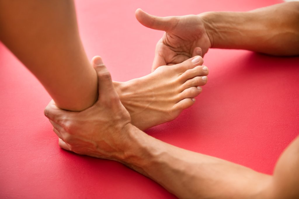 Massage for plantar fasciitis may help ease heel pain and stiffness by targeting soft tissue and supporting foot biomechanics.