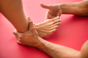 Massage for plantar fasciitis may help ease heel pain and stiffness by targeting soft tissue and supporting foot biomechanics.